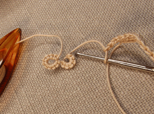 Tatting knots on one end and crochet stitches on the other end of the same cotton thread