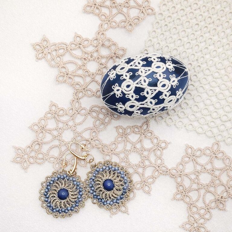 Navy Easter egg decorated with handmade tatting lace, matching tatting lace earrings and lace doily – elegant tatting lace ideas for gifts and home decor